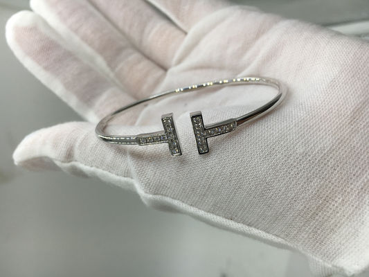 Qualità Oro bianco dei gioielli dell'oro del braccialetto 18K del cavo di T con i diamanti brillanti rotondi fabbrica
