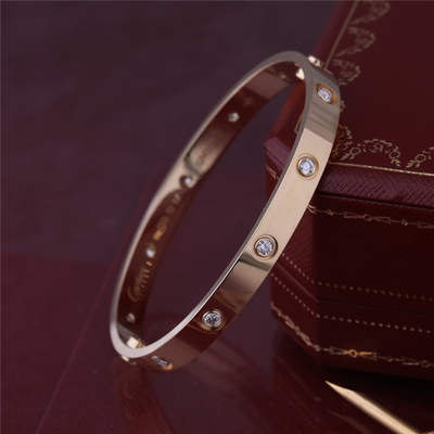 I diamanti classici del braccialetto 10 di amore di New York amano il modello spesso del braccialetto in gioielli del lusso dell'oro giallo 18K