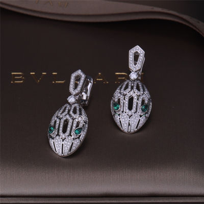 Qualità Gli orecchini di lusso di Serpenti di marca dell'oro nell'insieme dell'oro bianco 18K con Emerald Eyes e con i diamanti del pavé serpeggiano la testa fabbrica