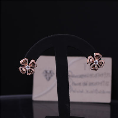 Qualità Alti orecchini di Fiorever dei gioielli dell'oro reale in 18 kt Rose Gold Earrings messa con due diamanti centrali ed i diamanti del pavé fabbrica